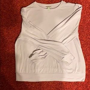 a light purple sweater